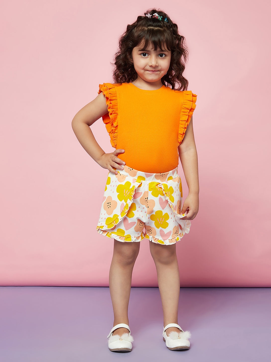 Kid Girls Orange Ruffle Top with Floral Print Shorts Set