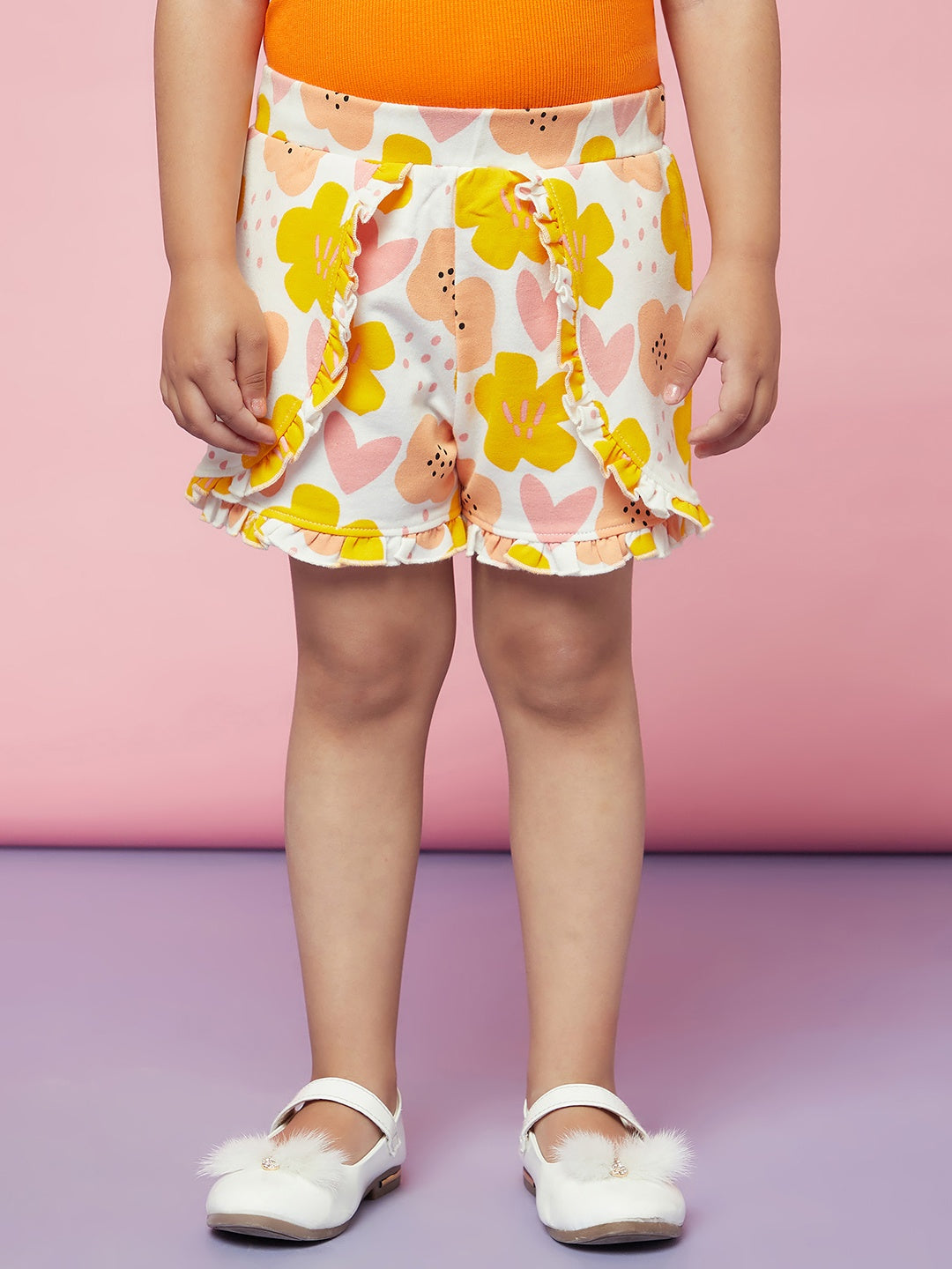 Kid Girls Orange Ruffle Top with Floral Print Shorts Set