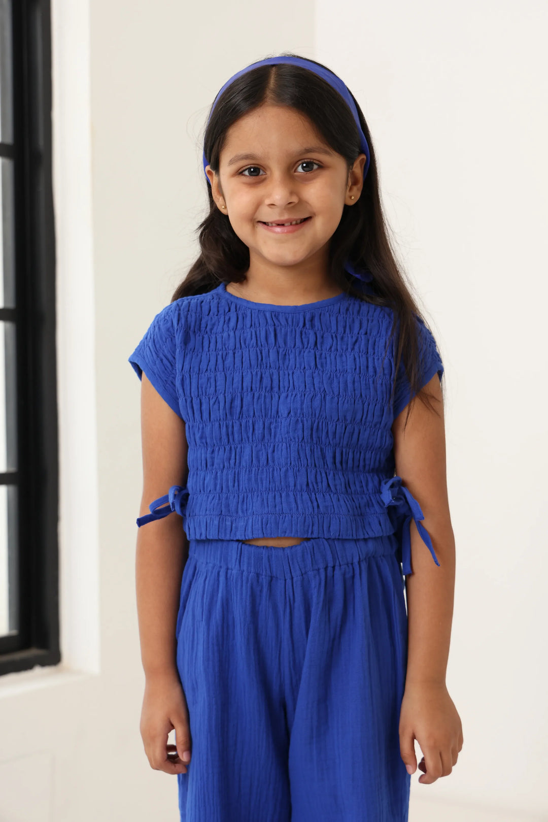 Spunkies Girls Blue Smocked Round Neck Sleeveless Top and Trousers Set