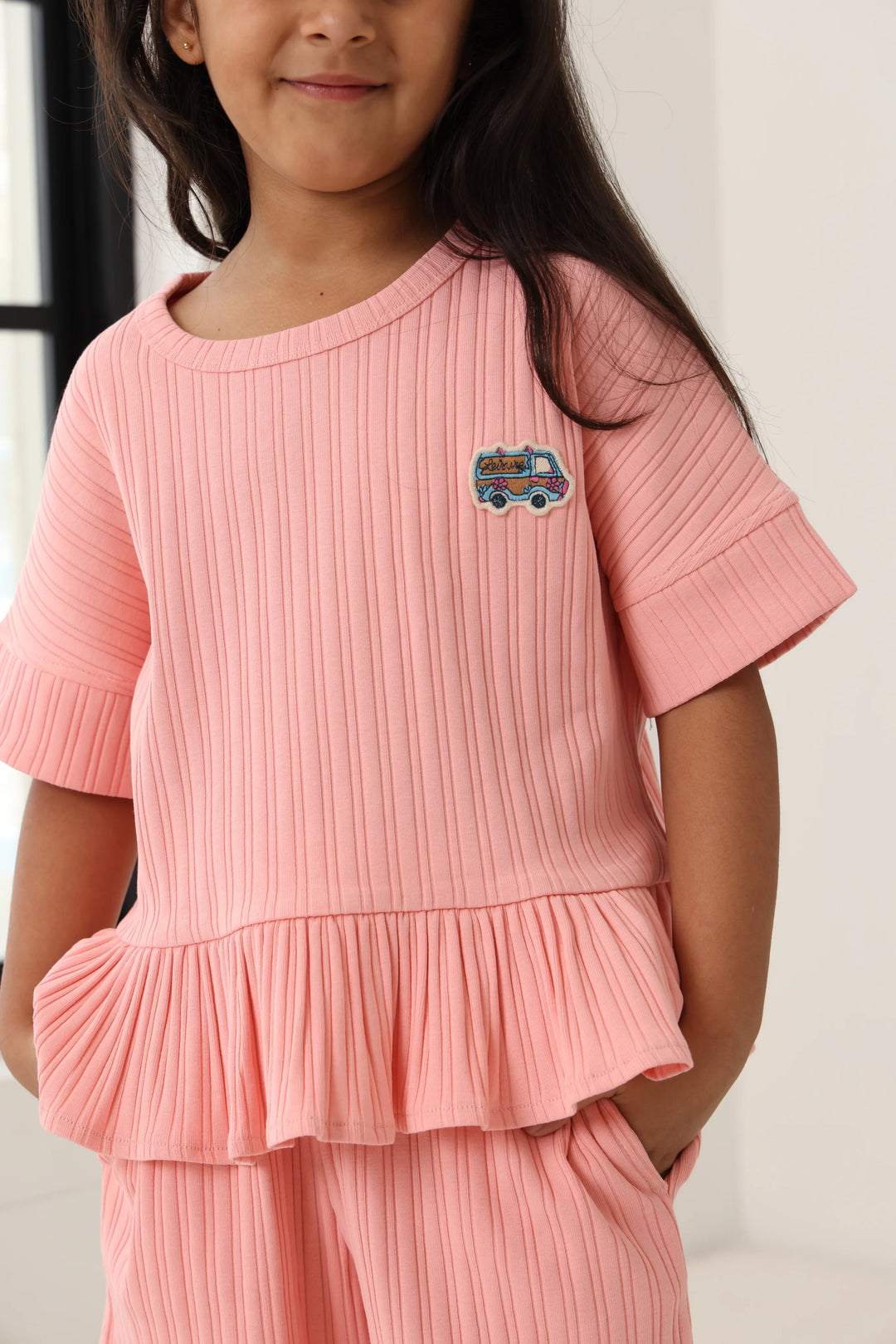 Spunkies Girls Pink Textured Round Neck Short Sleeves Peplum Top and Shorts Set