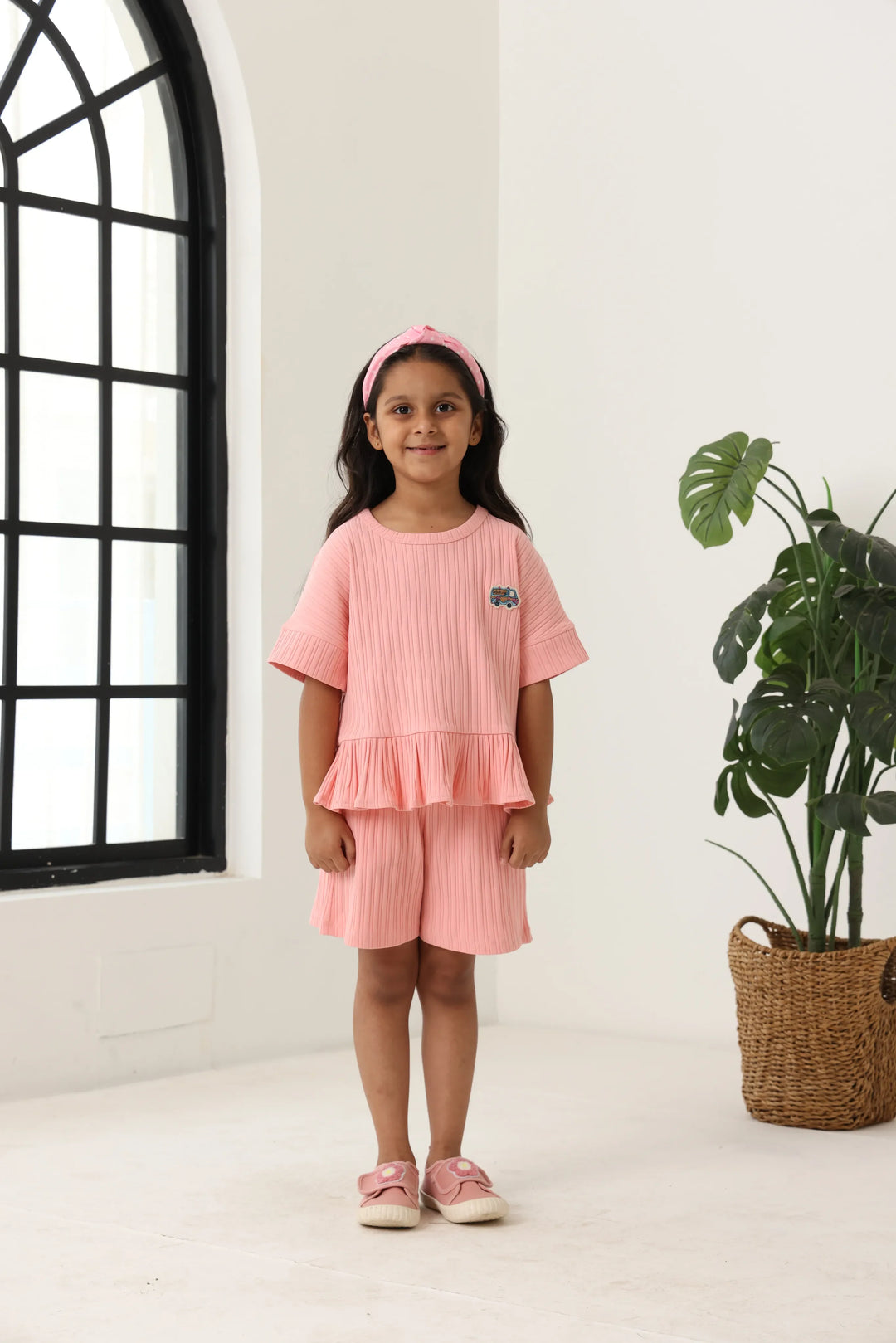 Spunkies Girls Pink Textured Round Neck Short Sleeves Peplum Top and Shorts Set