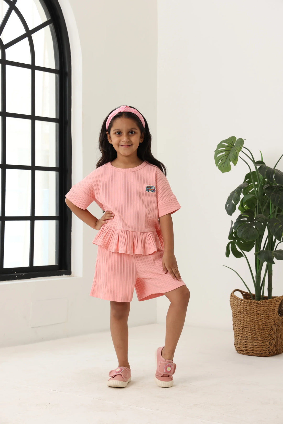 Spunkies Girls Pink Textured Round Neck Short Sleeves Peplum Top and Shorts Set