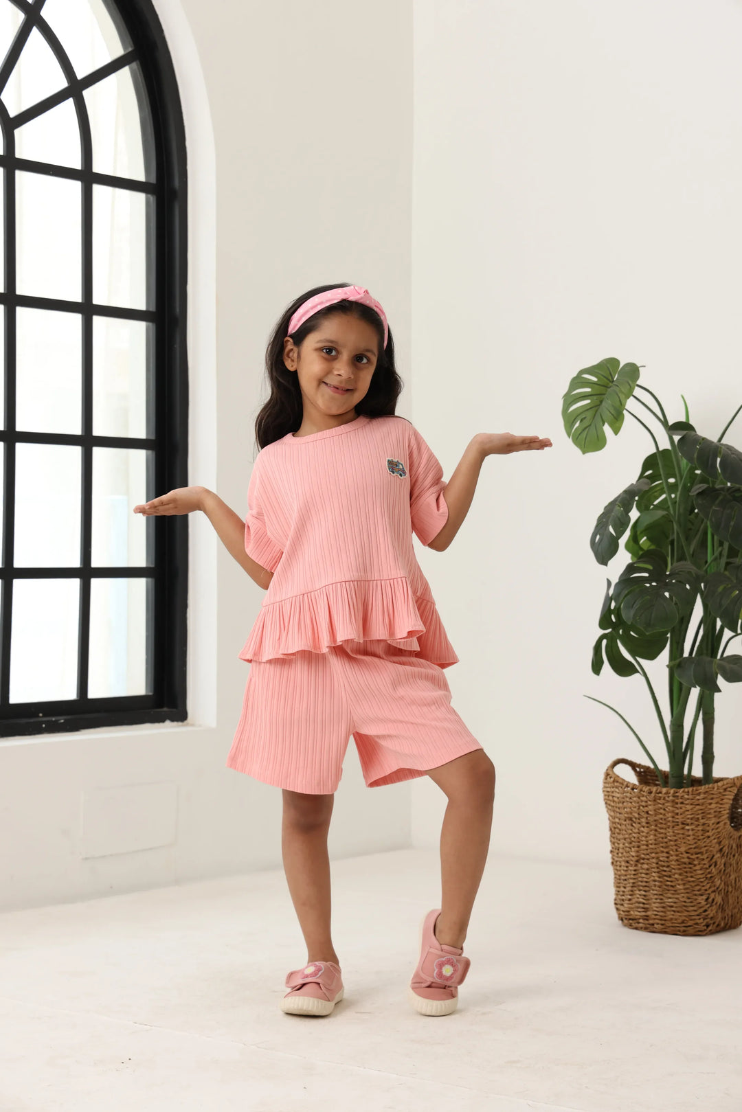 Spunkies Girls Pink Textured Round Neck Short Sleeves Peplum Top and Shorts Set
