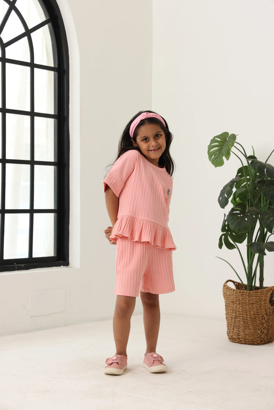 Spunkies Girls Pink Textured Round Neck Short Sleeves Peplum Top and Shorts Set
