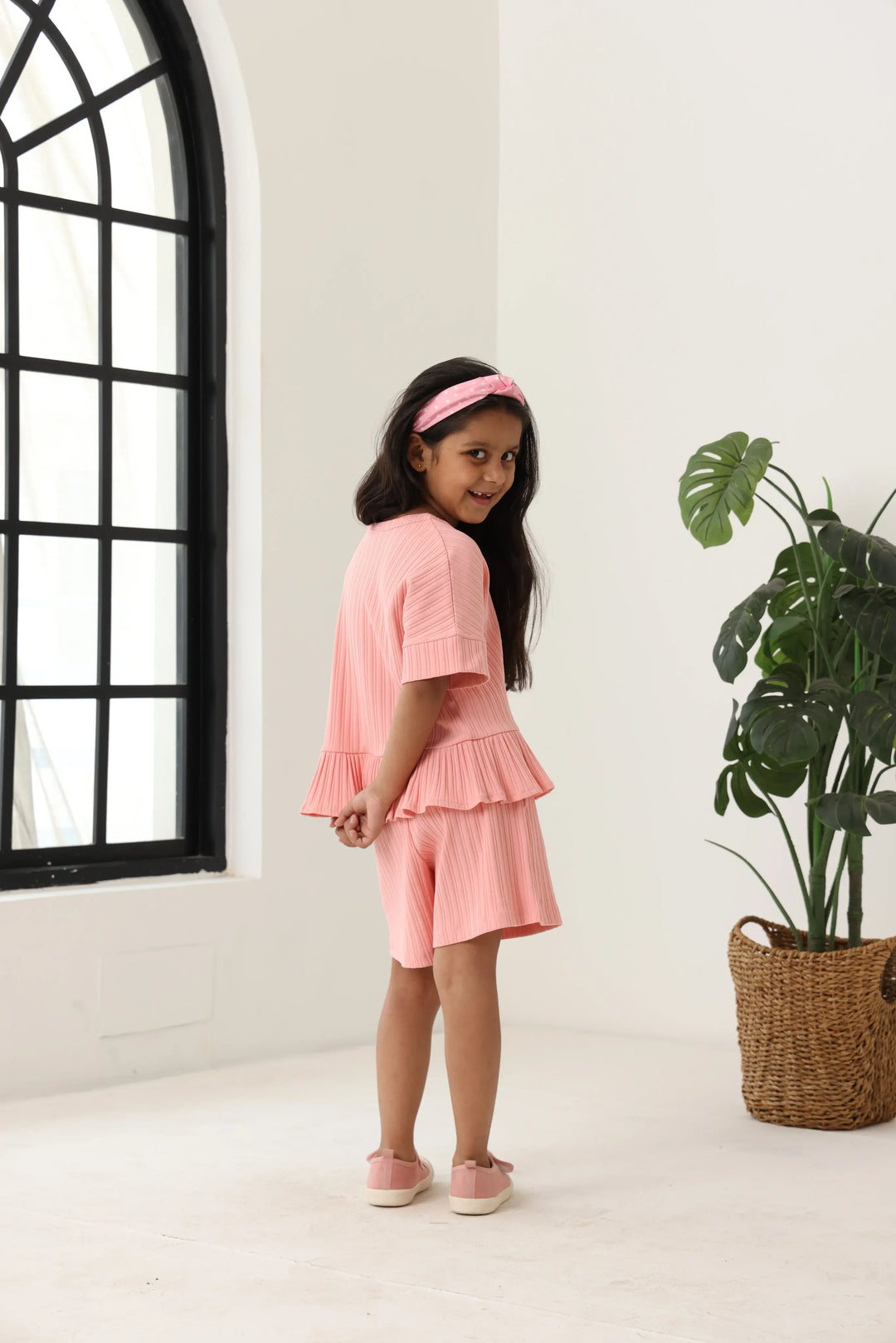 Spunkies Girls Pink Textured Round Neck Short Sleeves Peplum Top and Shorts Set