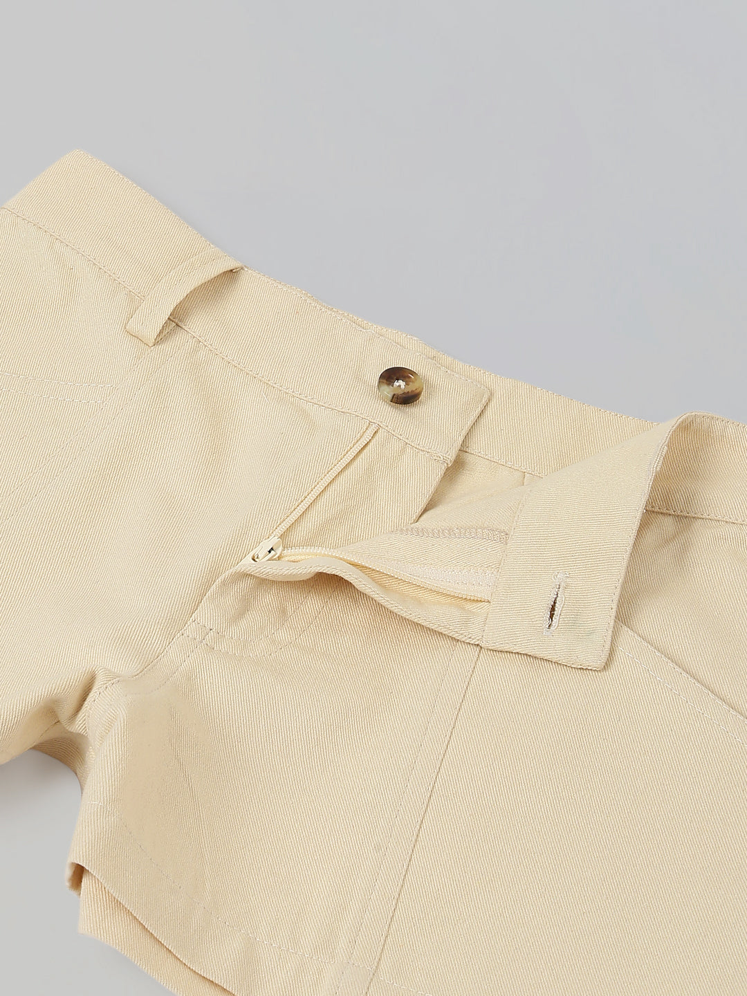 Spunkies Girls Beige Solid Button and Zip Shorts